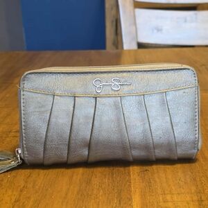 Jessica Simpson faux leather clutch wallet in a metallic grey